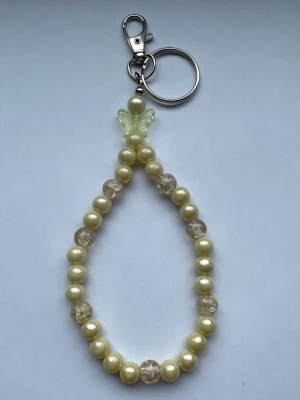 Gul nyckelring/bag charm💛 - Gul nyckelring/bag charm gjord av mig💕