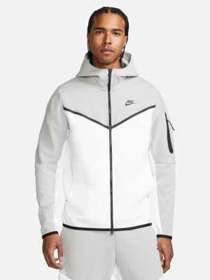 Nike tech fleece  - Nike hoodie med dragkedja i grått och vitt. Stora färgblock, svart Nike-logga på bröstet och svarta detaljer längs dragkedjan och ärmslut. Huva och ficka med dragkedja på ena ärmen. Tillverkad i mjukt sweatshirtmaterial, perfekt för chill eller träning.