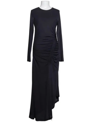 Svart långklänning med rynkade detaljer - OBS!! Både lappen i midjan & den i nacken är bortklippta, minns dock att den var från lindex & tror storlek M, kan lika gärna vara S men är inte 100% säker, så storlek S/M. Elegant svart långklänning med långa ärmar och rund halsringning. Klänningen har snygga rynkade detaljer längs sidan som ger en cool siluett. Tillverkad i ett mjukt och följsamt material som faller snyggt. Perfekt för dig som vill ha en stilren och trendig look.