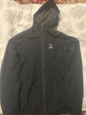 Haglöfs vindjacka  - Helt ny Haglöfs vindjacka i svart.