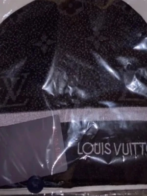 Svartgrå mössa L V - Snygg svartgrå mössa