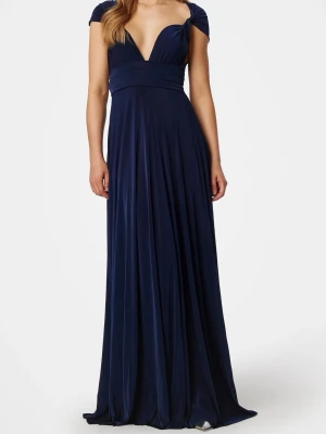 Marinblå långklänning från Goddiva - Supersnygg och elegant långklänning från Goddiva London. Klänningen har långa band som går att knyta på många olika sätt, bilderna visar två olika exempel (axelband eller som halterneck).