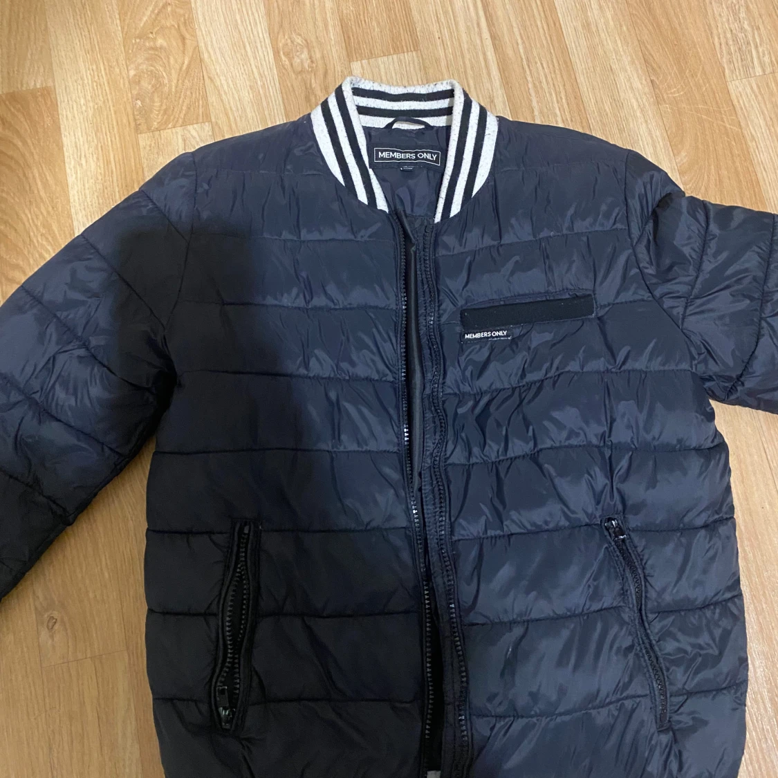 Svart quiltad bomberjacka Members Only