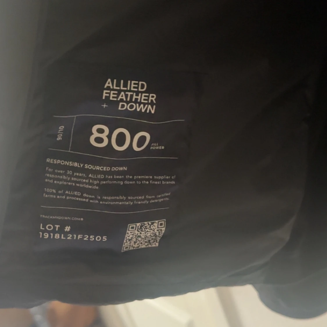 Svart dunjacka från Sail Racing - 2