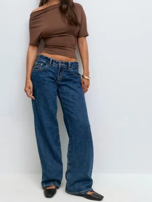 Blå wide jeans lågmidjade - Slutsålda lågmidjade jeans från Gina tricket, lappen kvar