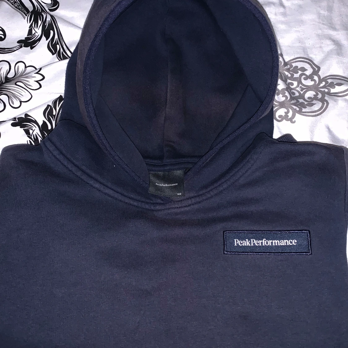 Mörkblå hoodie från Peak Performance - 2