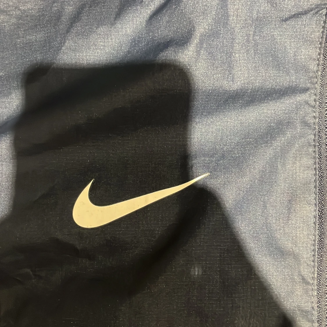 Mörkblå Nike vindjacka  - 2
