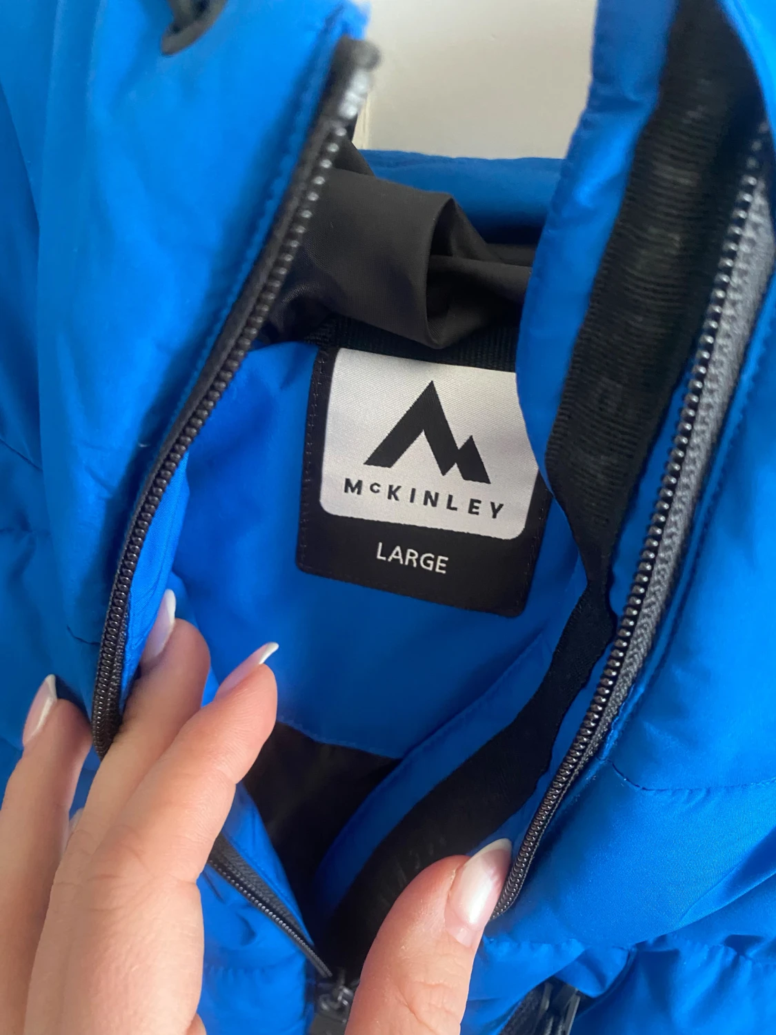 Blå McKinley pufferjacka med huva - 1