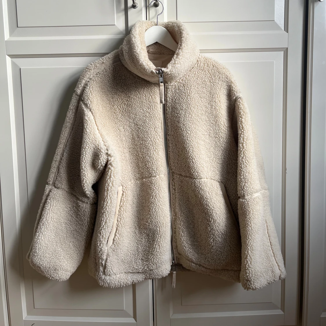 Beige teddyjacka hm