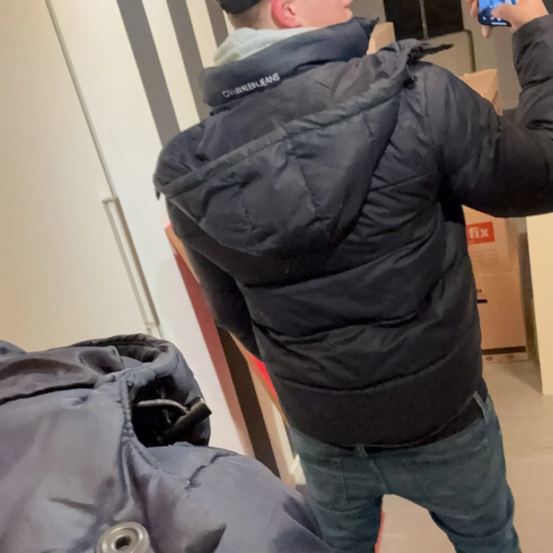 Mörkblå pufferjacka från Calvin Klein 