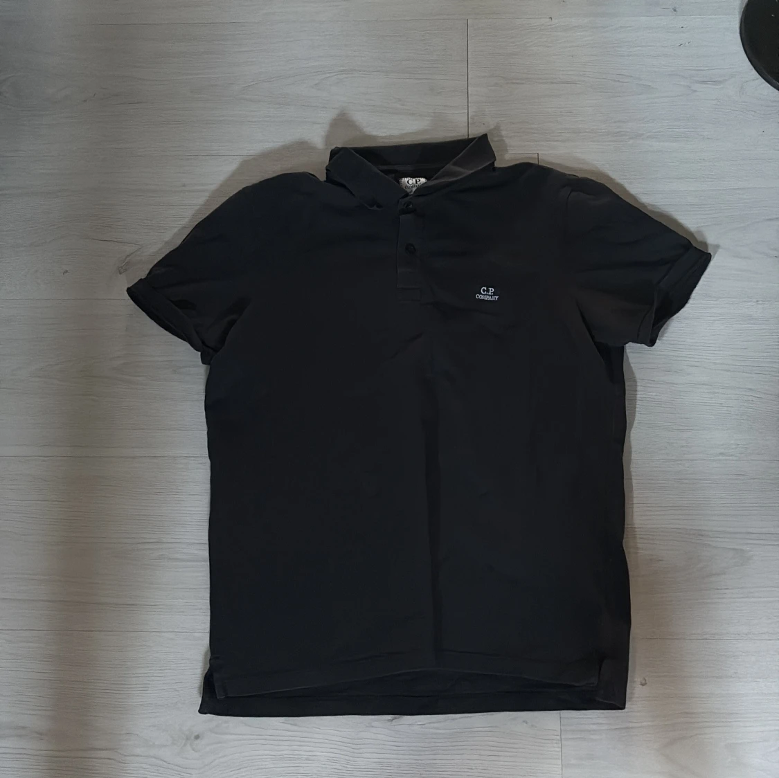 Mörkblå piké från C.P. Company