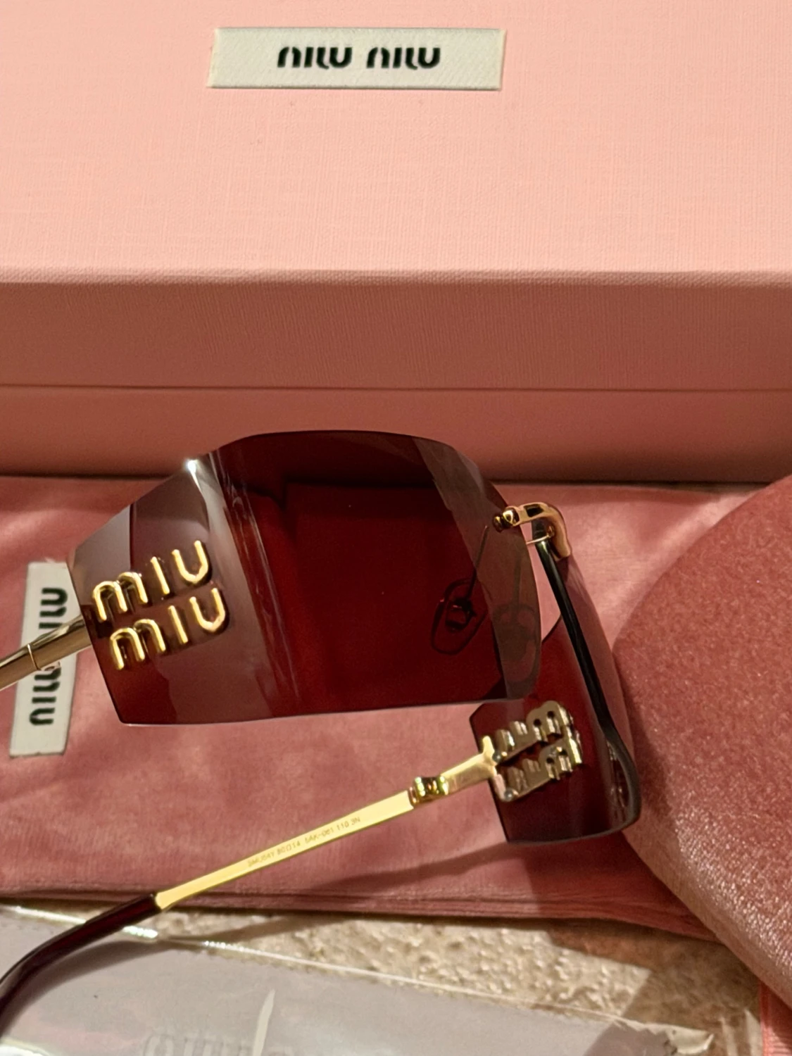 Röda solglasögon från Miu Miu - 4