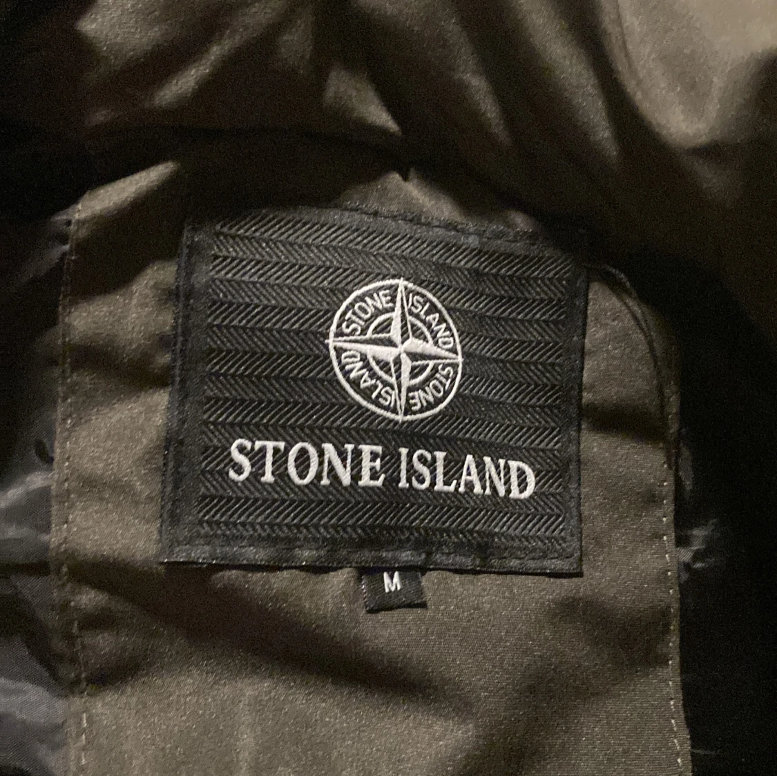 Mörkgrön dunväst från Stone Island - 3