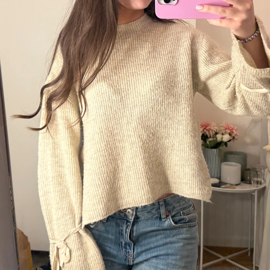 stickad tröja med rosetter - 1