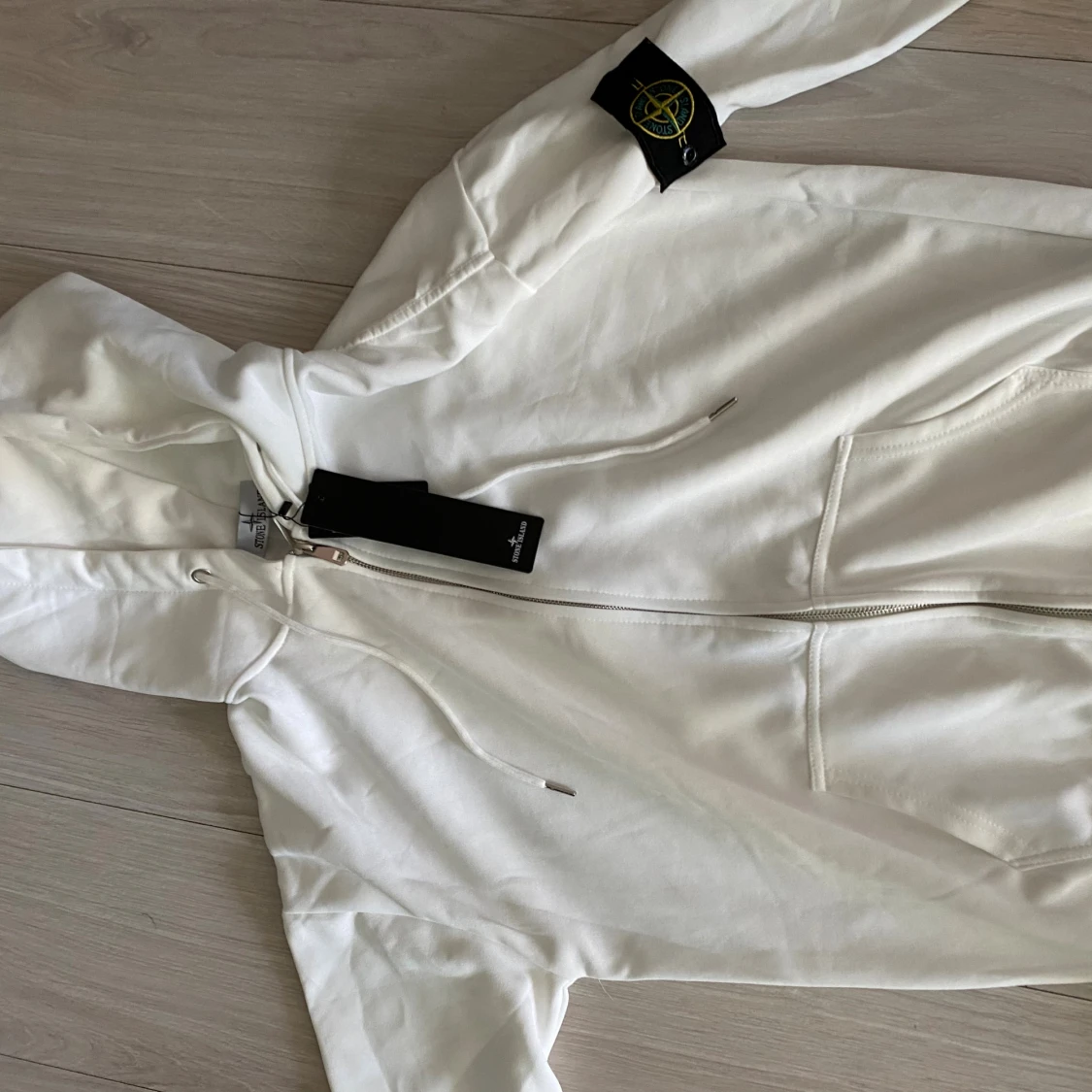 Vit hoodie från Stone Island