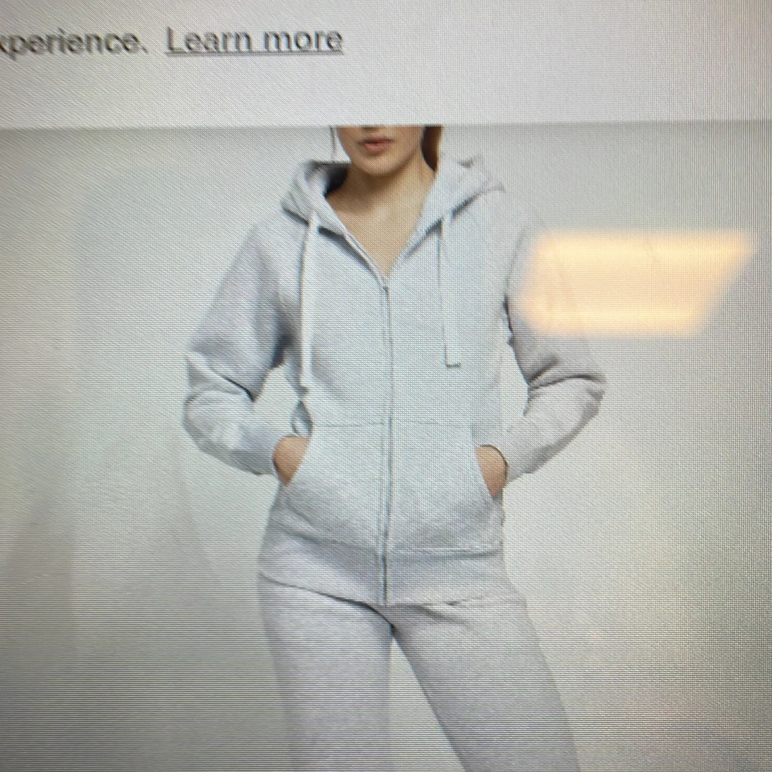 Ljusgrå hoodie med dragkedja