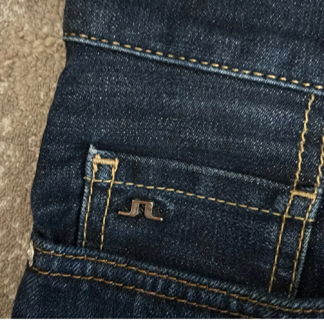 Mörkblå jeans från J.Lindeberg - 1