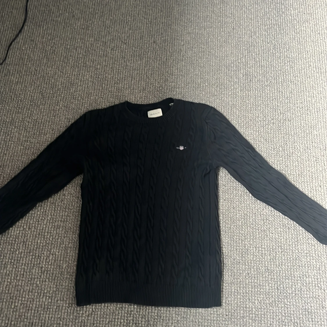 Svart kabelstickad tröja från GANT