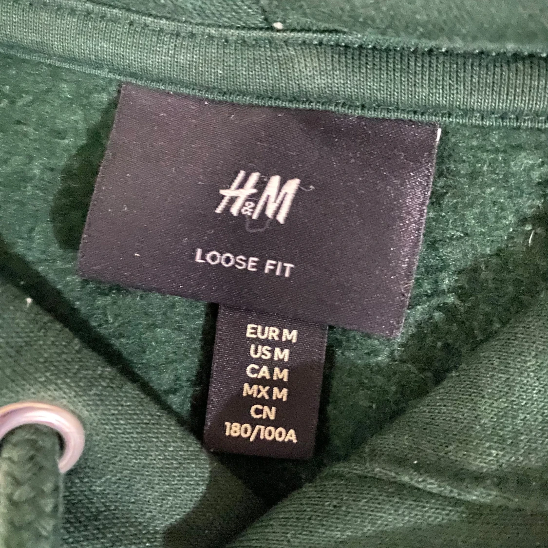 Mörkgrön hoodie från H&M loose fit - 1