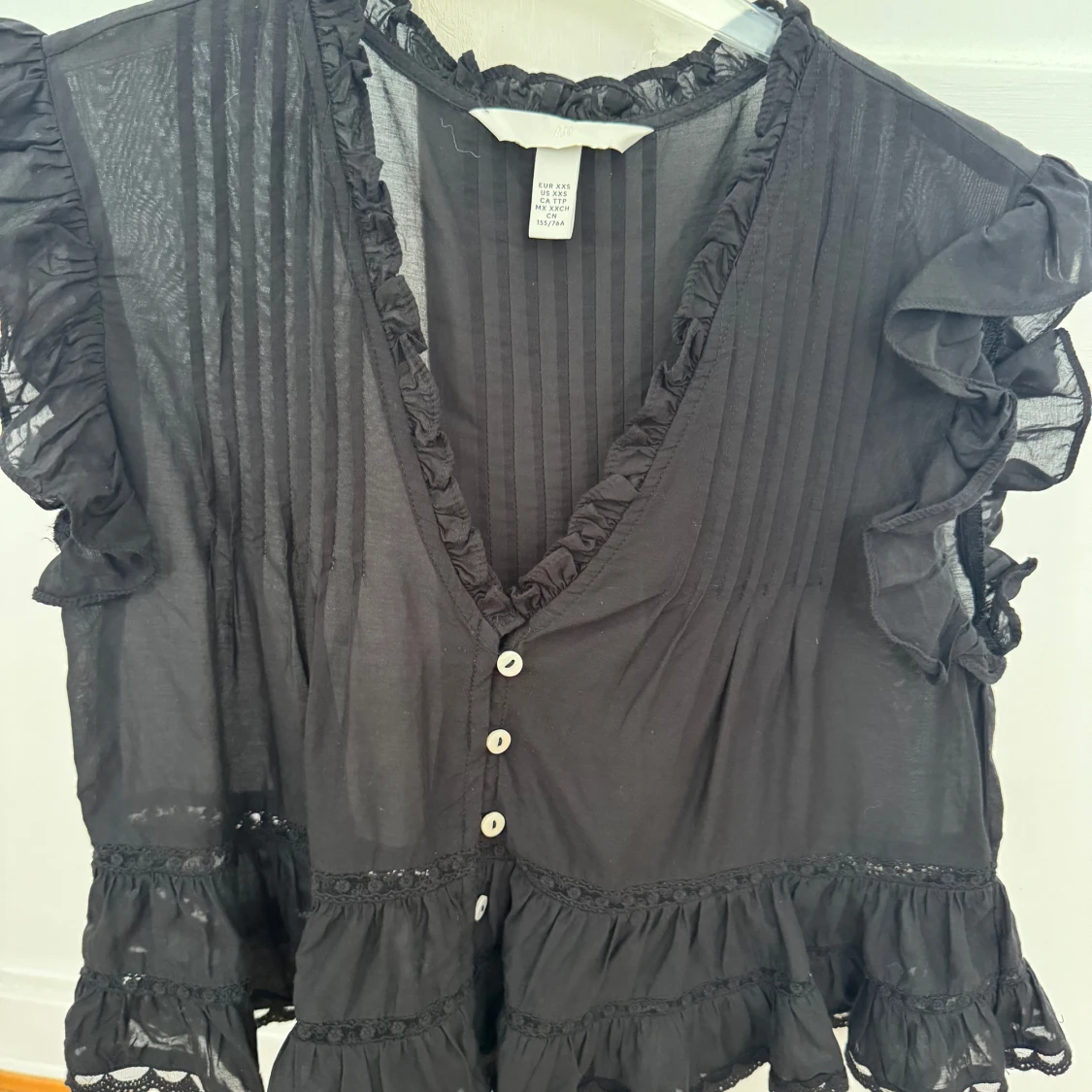 Svart volangblus från H&M