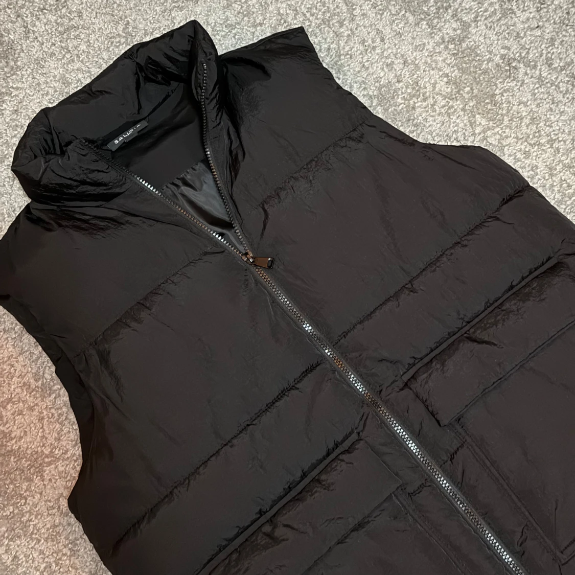 Svart dunväst   - 2