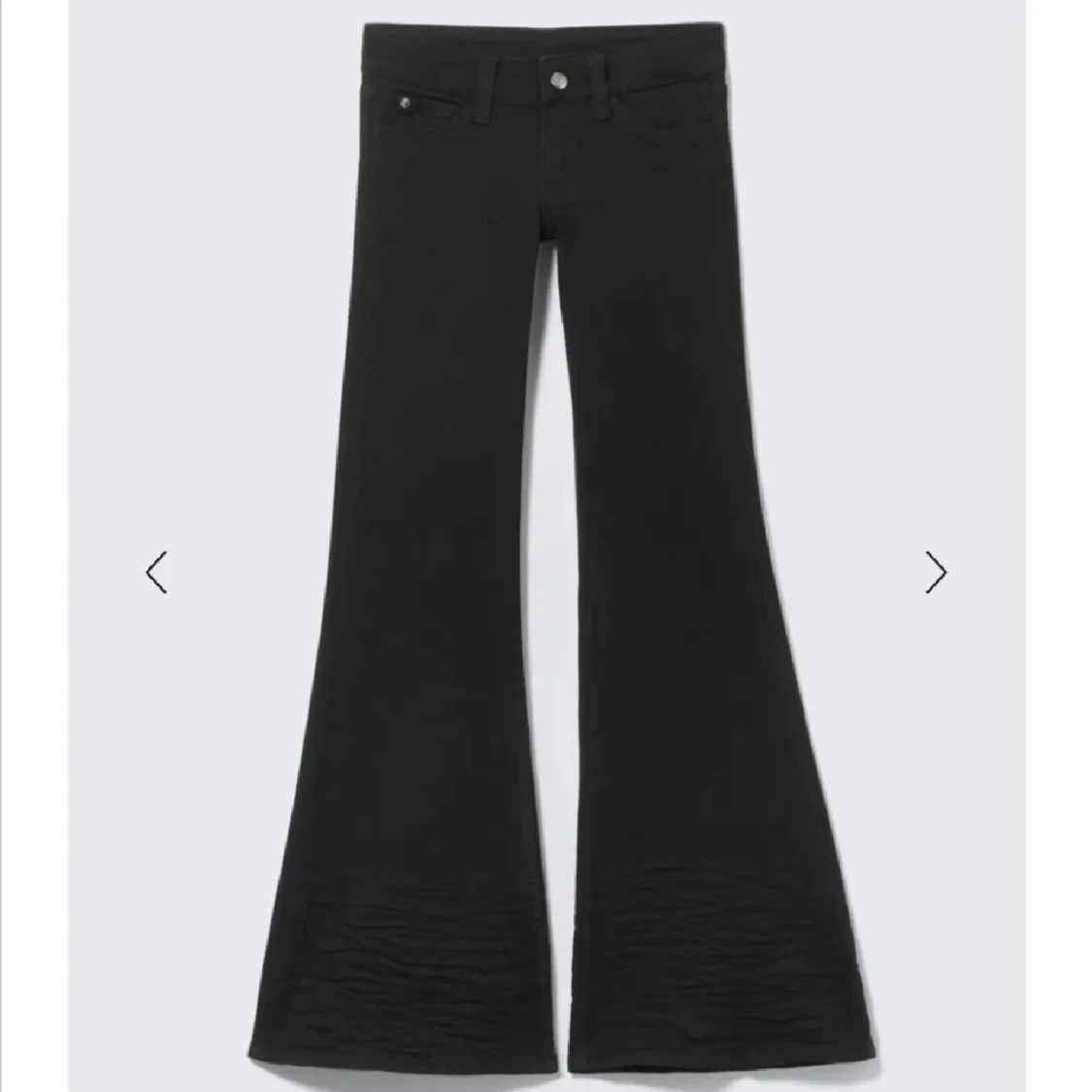Svarta bootcut jeans med låg midja