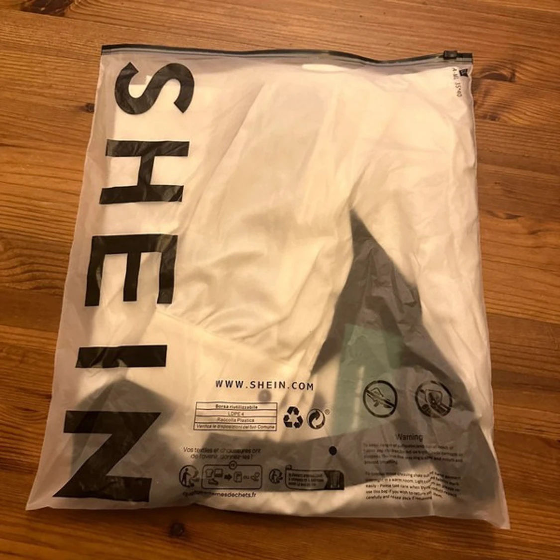 Croppad svartvit jacka från SHEIN XS