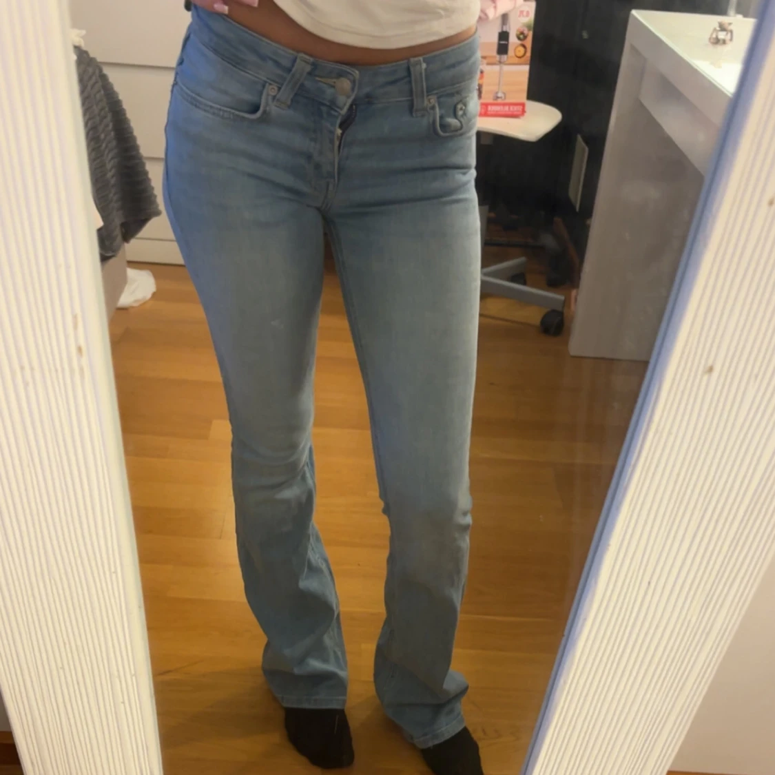 Ljusblå bootcut jeans