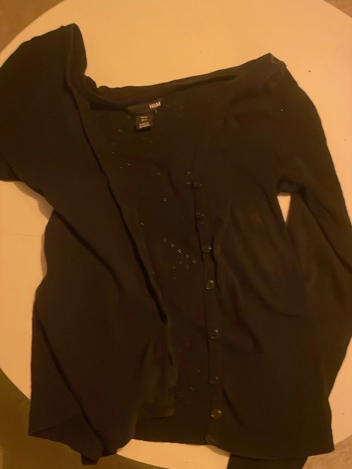 Svart kofta från H&M med knappar