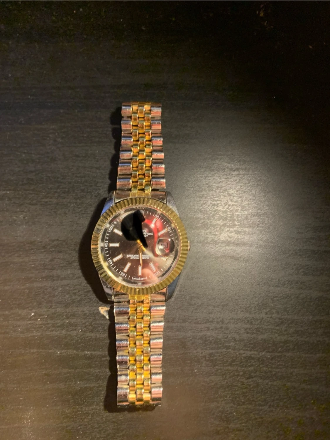 Tvåfärgad klocka från Olevs - 1