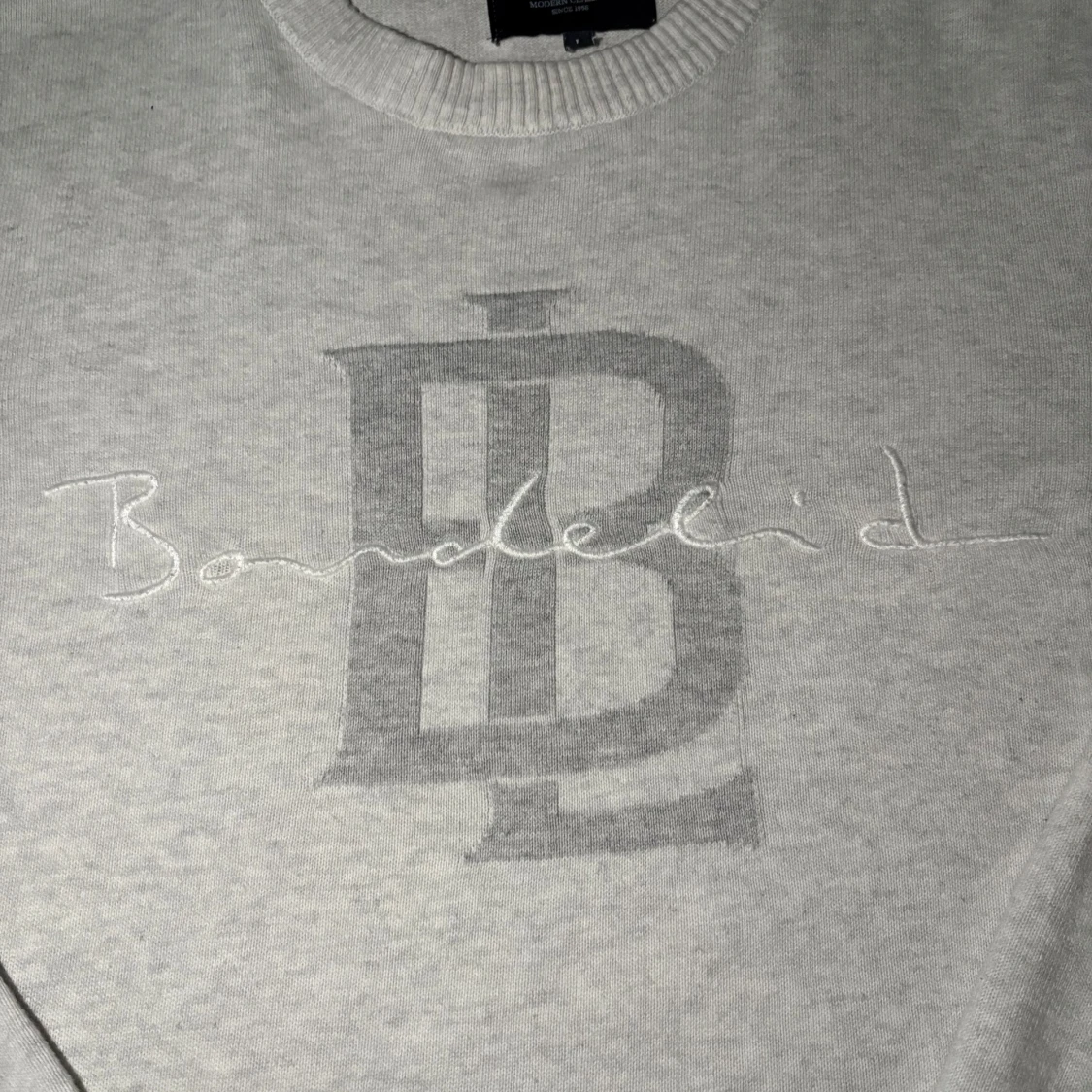 Ljusgrå stickad tröja från Bondelid