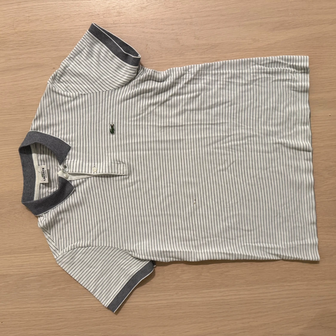 Randig pikétröja från Lacoste