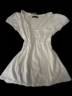 Babydoll top - Tag says L but it fits M