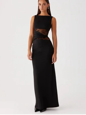 Svart långklänning med spetsdetaljer - Supersnygg svart långklänning ifrån märket Tuva Stockholm. Den är endast testad en gång då den var lite kort på mig som är ca 178