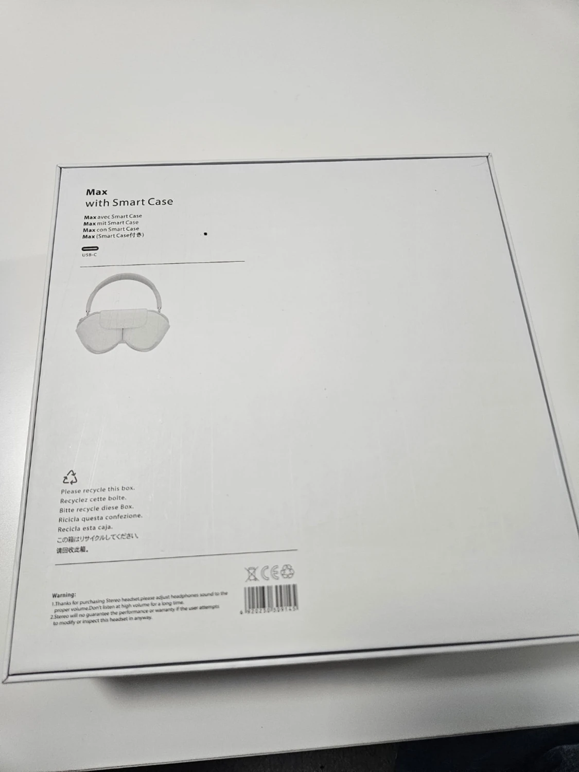 Ett par vita hörlurar  - 6