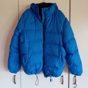 Pufferjacka Mouli  - Jackan är i nyskick och i storlek M