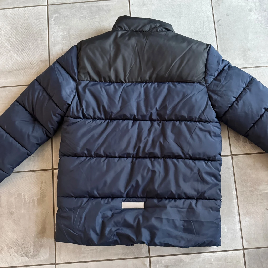 Mörkblå pufferjacka från Name It - 1