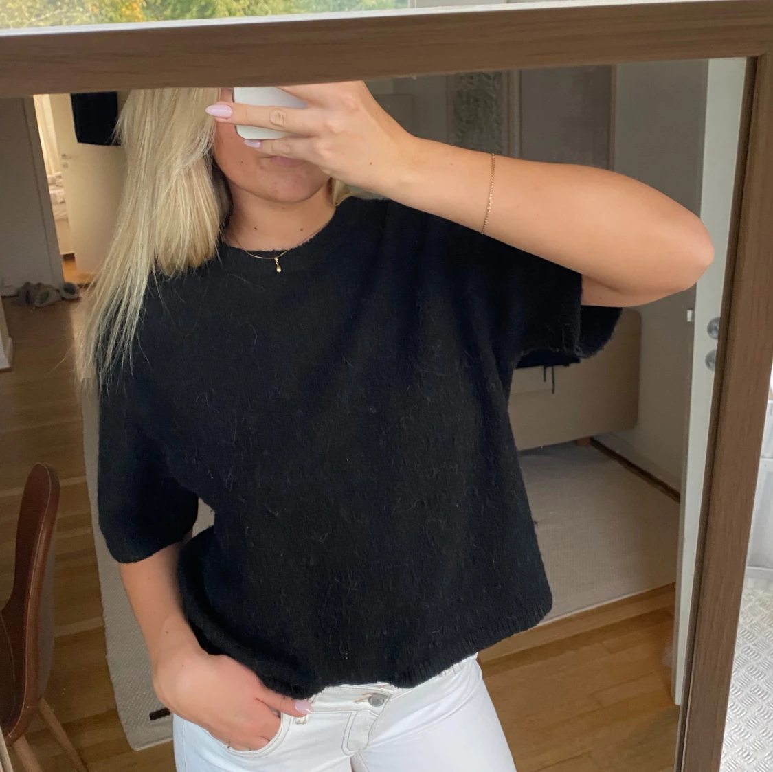 Svart stickad kortärmad tröja