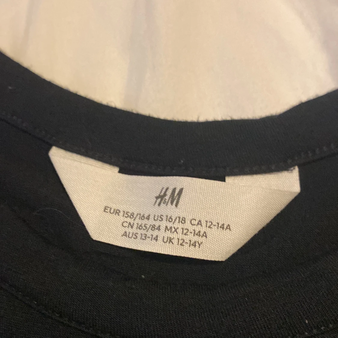 Svart topp med trekvartsärm från H&M - 2