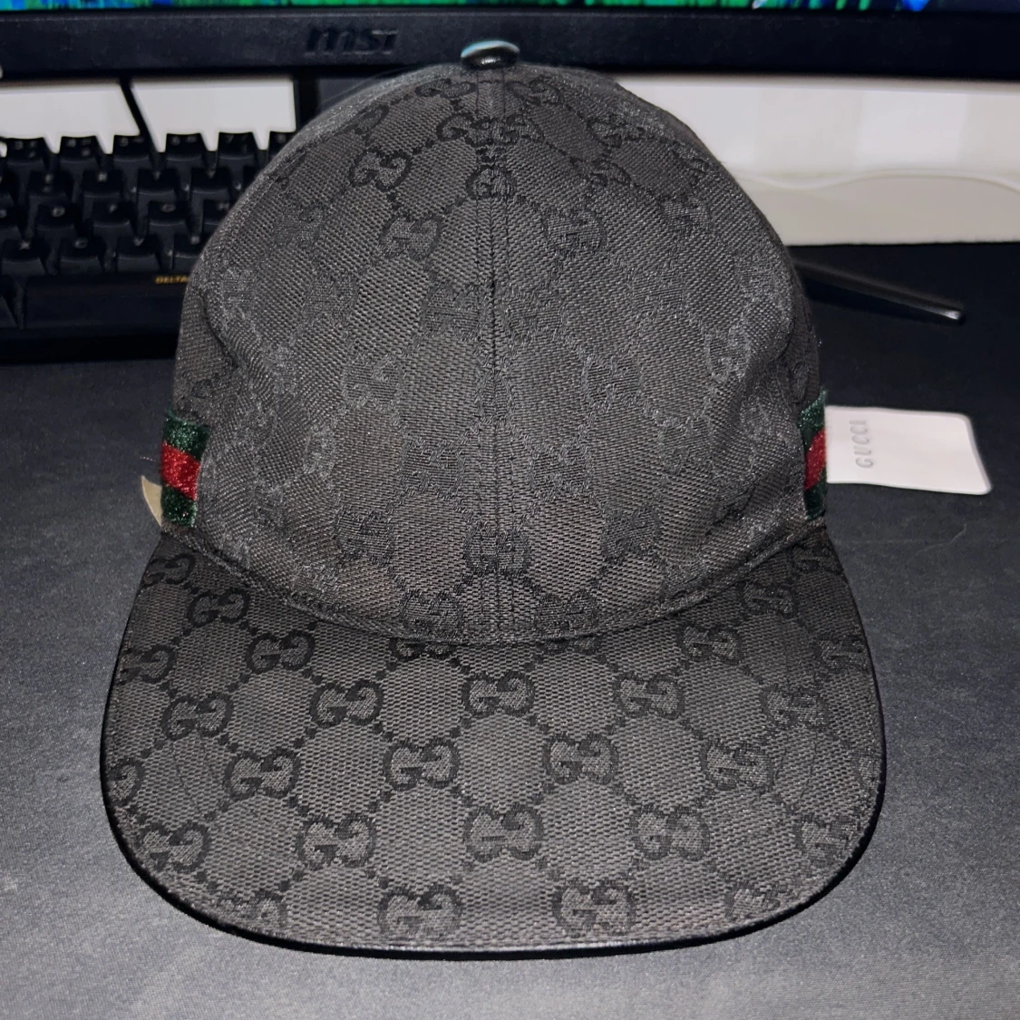 Svart keps från Gucci med GG-mönster - 1