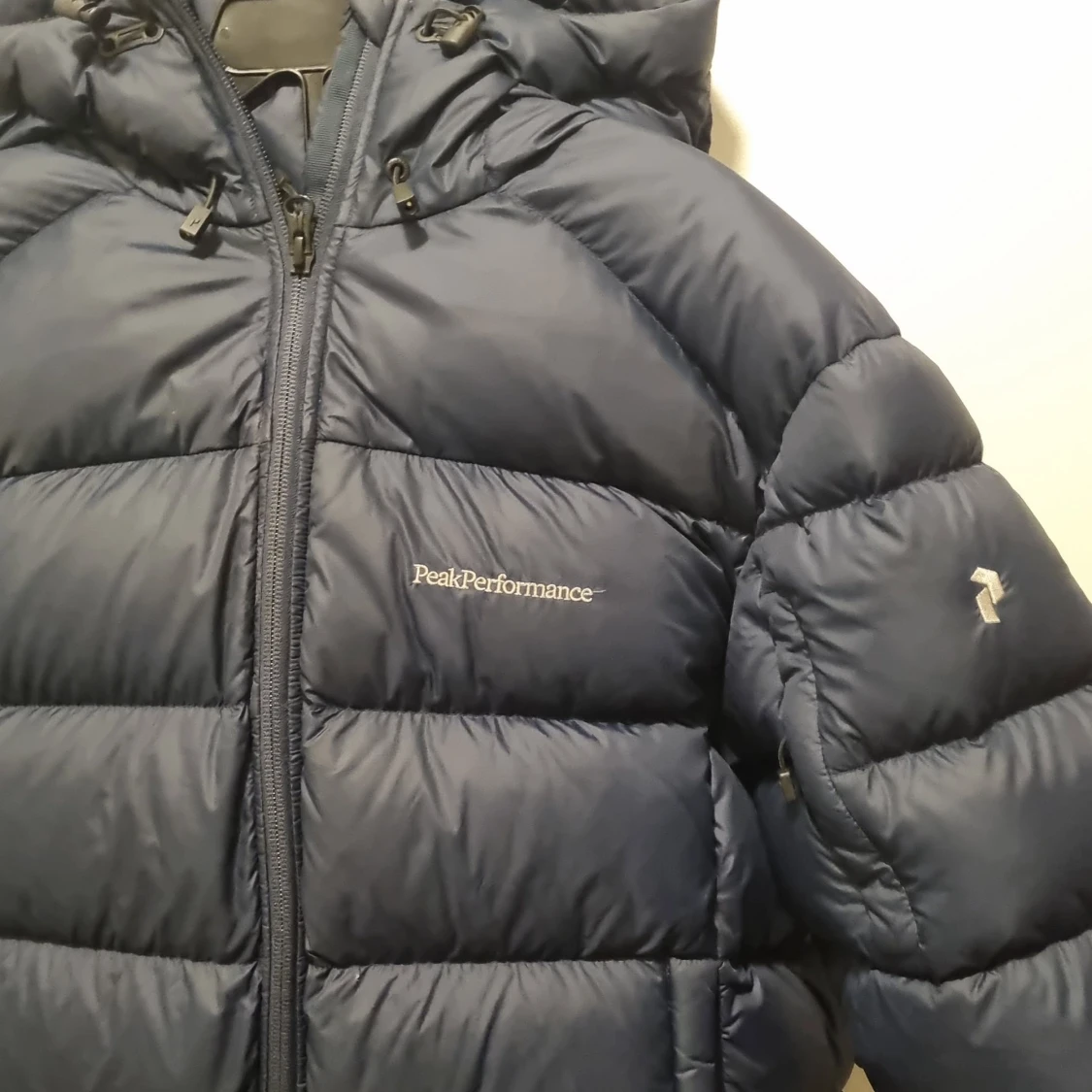 Mörkblå dunjacka Peak Performance - 1