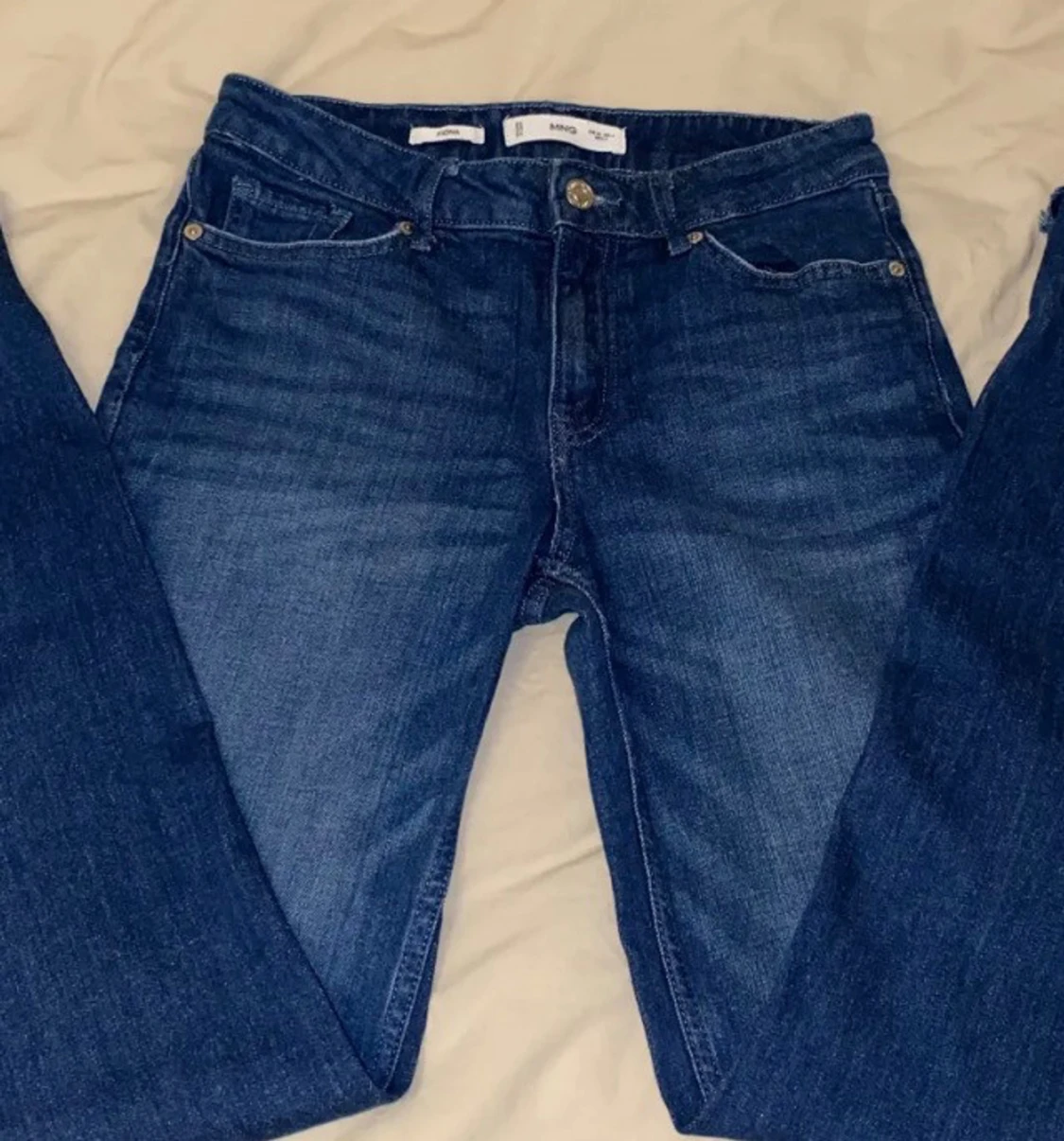 Mörkblå bootcut jeans från Mango - 2