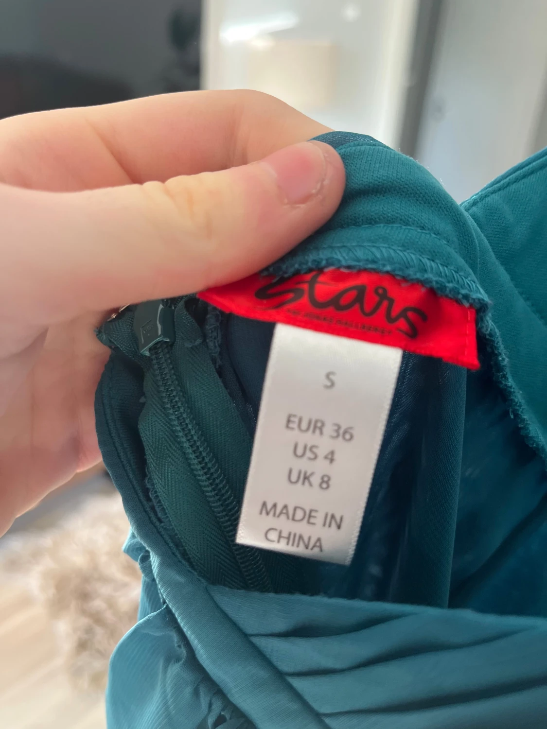 Turkos halterneckklänning från Stars - 1