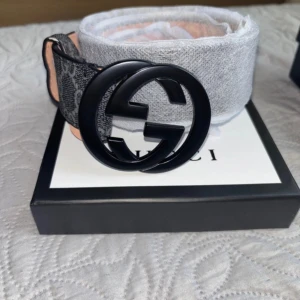 GG bälte - Svart grått bälte från GG 110 cm samt kvitto medföljer