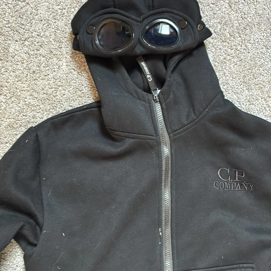 Svart hoodiejacka från C.P. Company