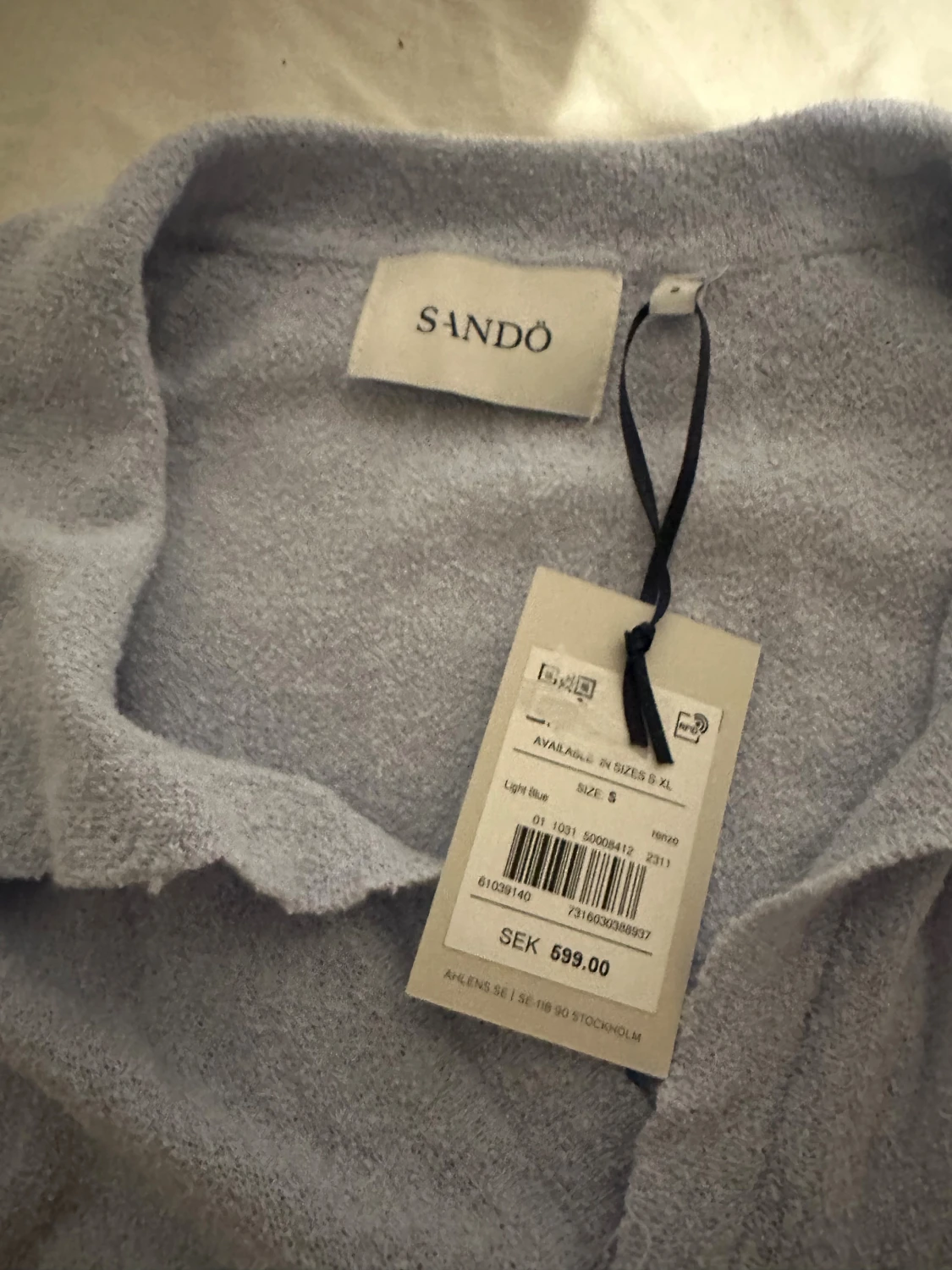 Ljusblå pikétröja från Sandö - 1