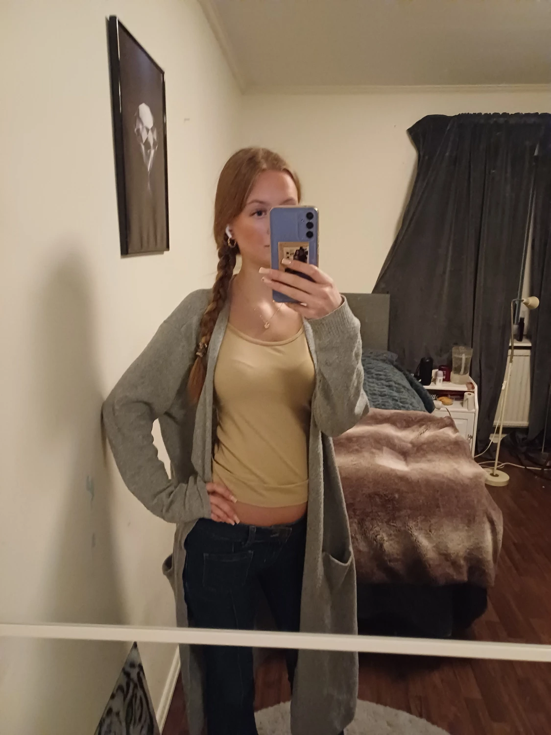 Lång grå stickad tröj med fickor