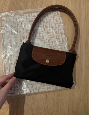 Svart handväska från Longchamp - Svart Longchamp-väska