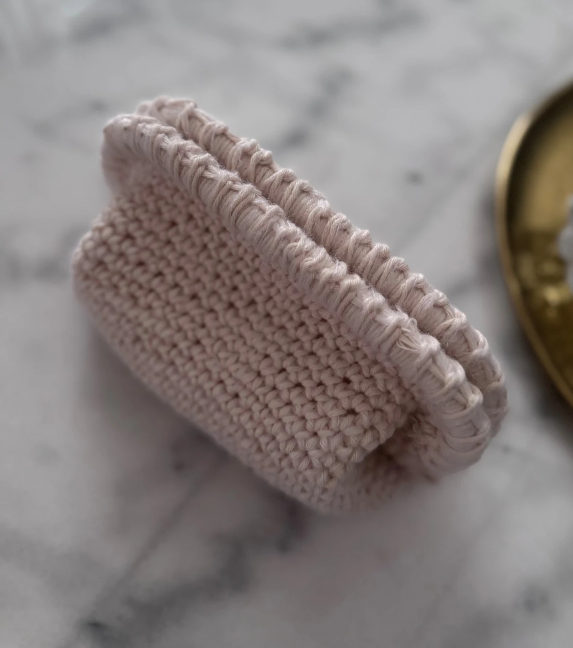 Biege handvirkad clutch  - 1