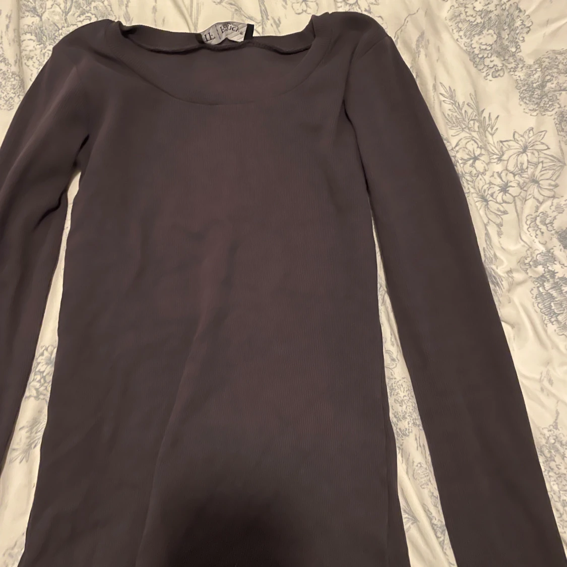 Svart långärmad topp från Facy